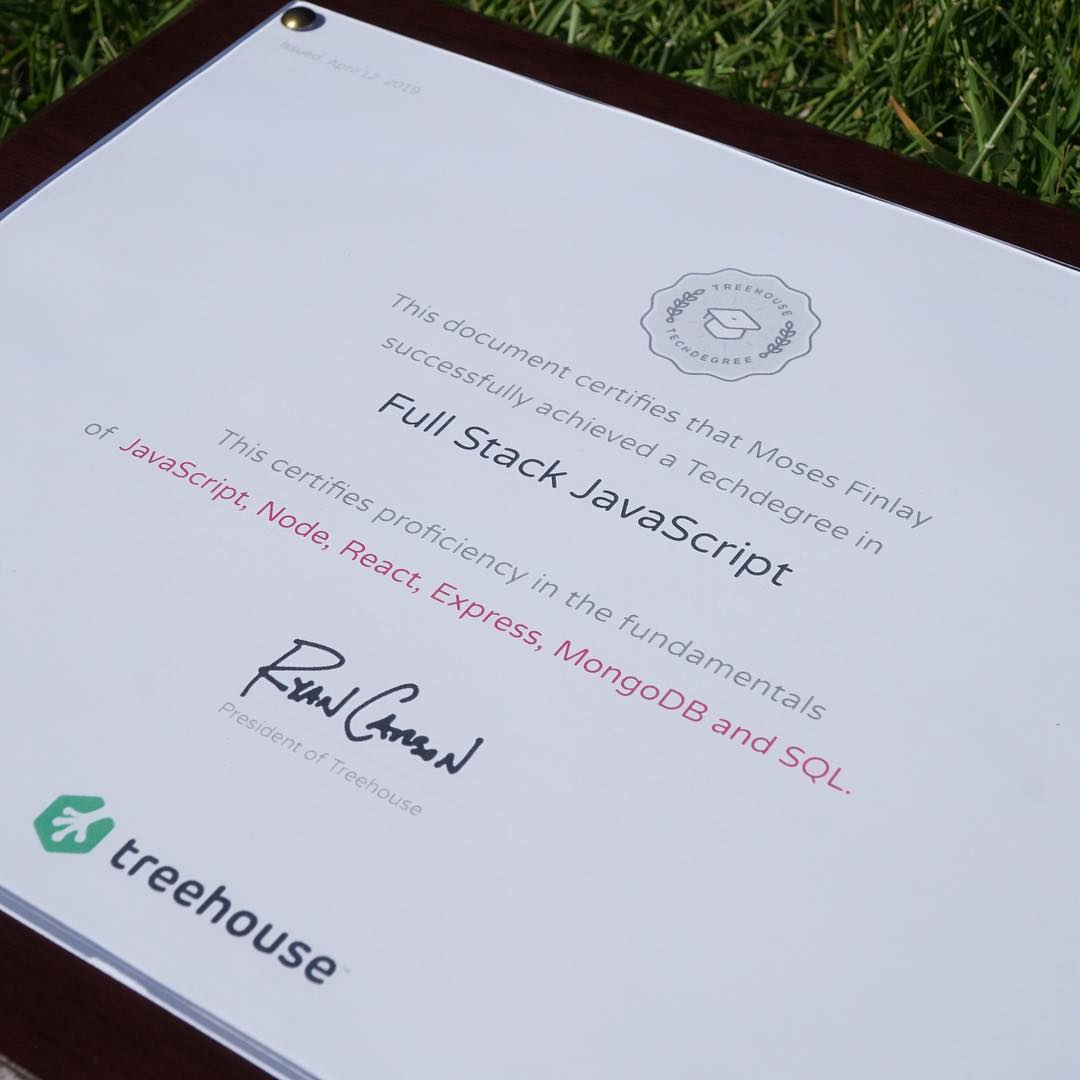 Close-up of Moses Finlay’s framed Treehouse Full Stack JavaScript Techdegree certificate